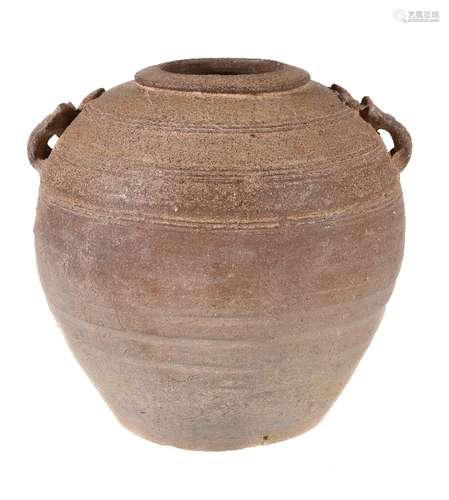 A Chinese proto-porcelain pottery jar, Han Dynasty (206BC-AD220), of ovoid shape with bands of rings