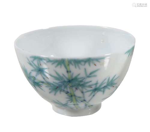 A small Doucai ' Bamboo ' wine cup, delicately potted with deep rounded sides rising from a short