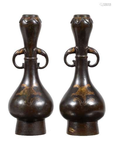 A pair of Chinese two-handled parcel-gilt bronze vases, 16-17th century, the ovoid bodies