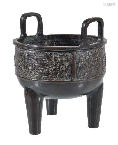 A Chinese archaistic bronze tripod censer, ding, after a Western Zhou original, the body supported