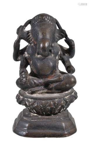 A small bronze figure Ganesha, Northern India, 19th century, the elephant headed four armed deity