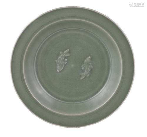 A Chinese Longquan celadon 'Twin Fish' dish, Southern Song Dynasty, the interior moulded with a pair