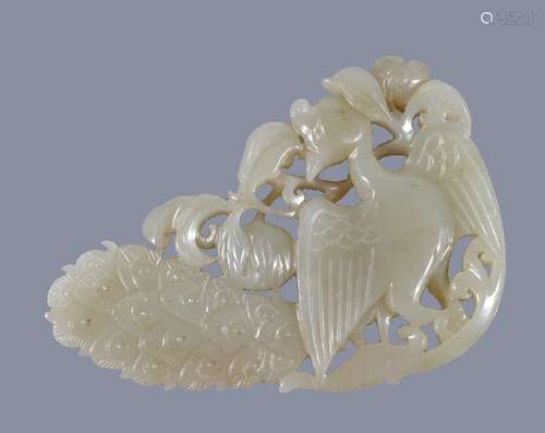 A Chinese pale celadon and russet 'peacock' pendant, with pierced work, 7.3cm high x 5cm wide x