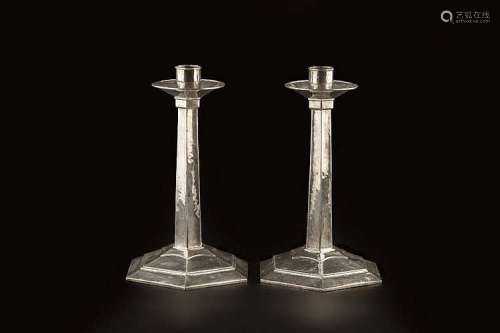 Guild of Handicrafts Pair of silver candlesticks