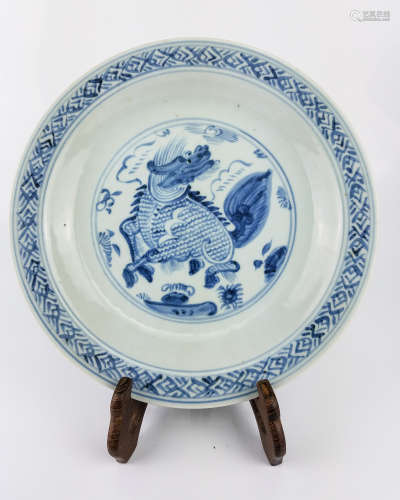 A BLUE AND WHITE DISH