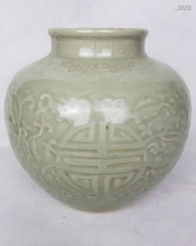 A CELADON-GLAZED JAR