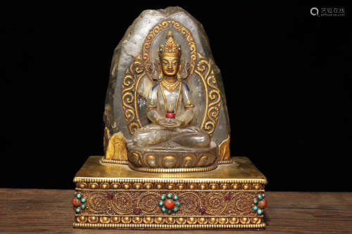 A GLIT-BRONZE CRYSTAL BUDDHA FIGURE