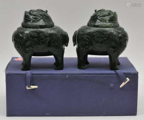 Pair of Jade censers. China. 19th century. Spinach green stone. Carved as a caparisoned Luo Dan. 6