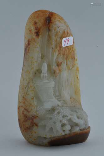 Jade Mountain. China. 19th century. Natural pebble shape carved as a temple in a mountain grotto. Grey white stone with pronounced russet markings. 5