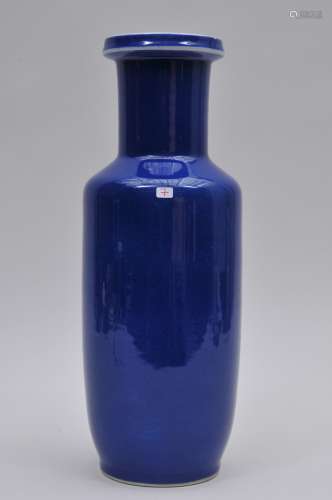 Porcelain vase. China. 19th century. Roleau form. Deep blue glaze. 14