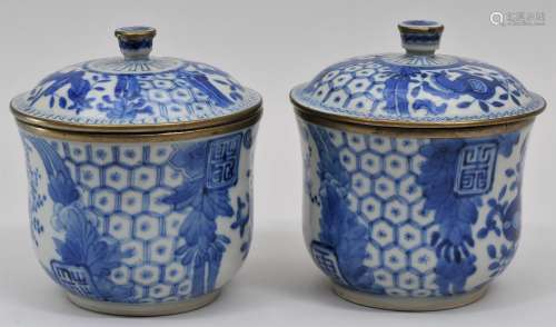 Pair of covered jars. Chinese Export ware for the Thai or Vietnamese market. Underglaze blue decoration of prunus, pomegrantes, brocade patterns and auspicious characters. Two character mark Nei Fu 