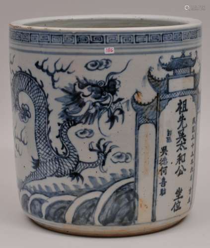 Porcelain censer. China. Dated June 1945. Decorations of dragons flanking a pavillion. Cylindrical form. 10-1/2
