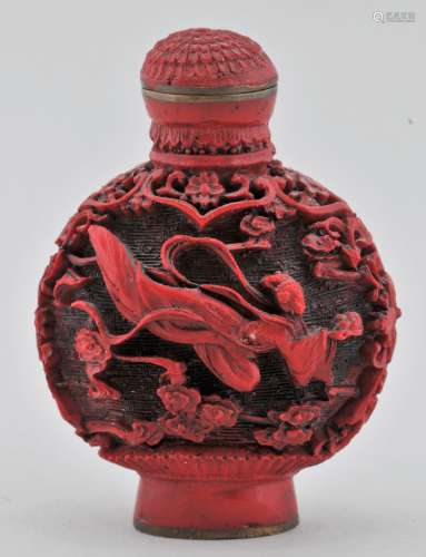 Snuff bottle. China. 20th century. Carved cinnebar? 2-1/4