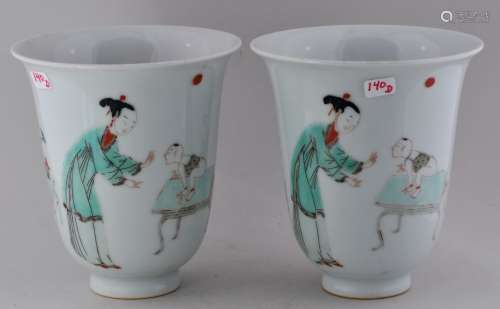 Pair of porcelain beakers. China. 19th century. K'ang His style decoration of women and children in Famille Verte palette. 4