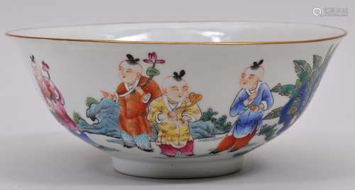 Porcelain bowl. China. 20th century. Famille rose decoration of children playing. Kuang Hsu mark on the base. 7-1/2