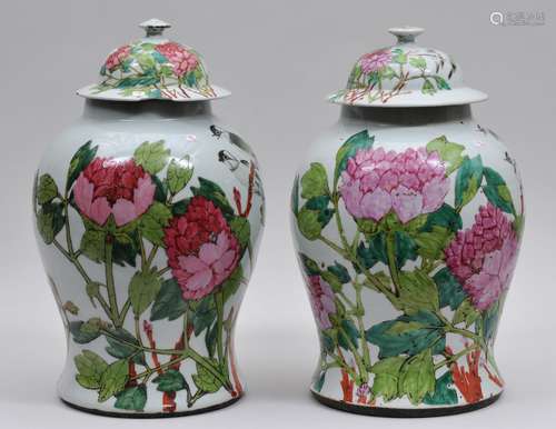 Pair of porcelain covered jars. China. Early 20th century. Famille Rose decoration of birds and flowers. 16