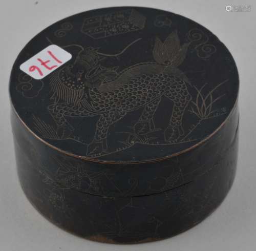 Round copper box. China. 19th century. Blackened surface inlaid with brass wires. Design of a Sea Horse (Hai Ma) with books. 2-1/2