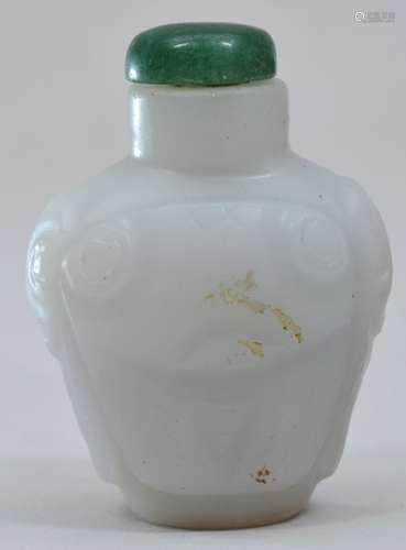 Snuff bottle. China. 19th century. White jade carved with cicadas. 1-7/8