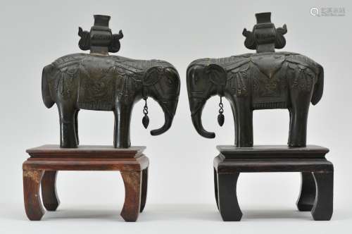 Pair of bronze elephants. China. 19th century. Caparisoned with vases on their backs. 6