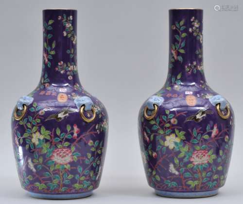Pair of porcelain vases. China. 20th c entury. Bottle form. Ta Ya Chai type. Purple ground decorated with birds and flowers. 14