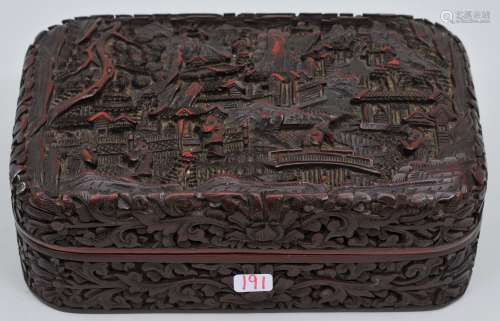 Carved Cinnabar box. China. 19th to early 20th century. Scene of figures in a landscape and floral scrolling.  6