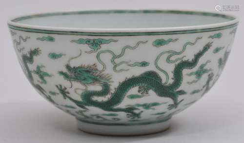 Porcelain bowl. China. 19th century. Decoration of five dragons with clouds. Yung Cheng mark. 4-5/8