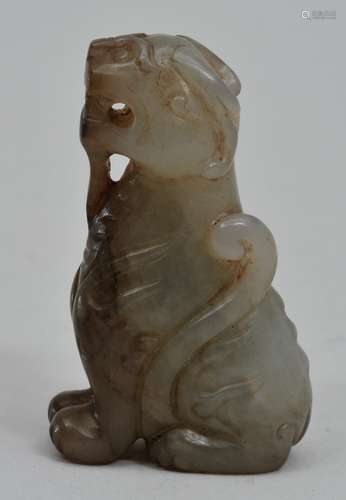 Jade mythical animal. Ming period. (1368-1644). Grey stone with areas of amber colour. 1-5/8