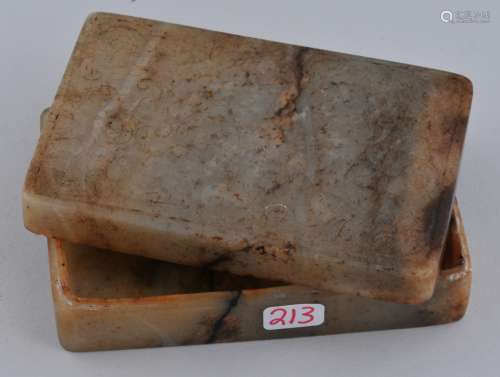 Jade box. China. 19th century. Rectangular shape stone of grey colour with pronounced black markings. Surface carved with two mythical animals. 3-1/2