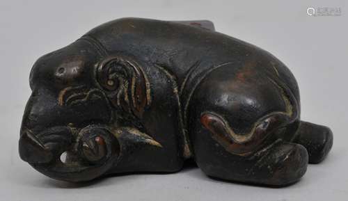 Bronze paperweight. China. 18th century. Study of a reclining elephant. 2-1/4