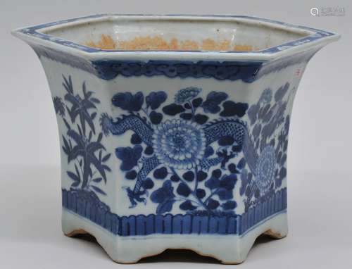 Porcleain planter. China. 19th century. Hexagonal form. Underglaze blue decoration of dragon and flowers. 8-1/4