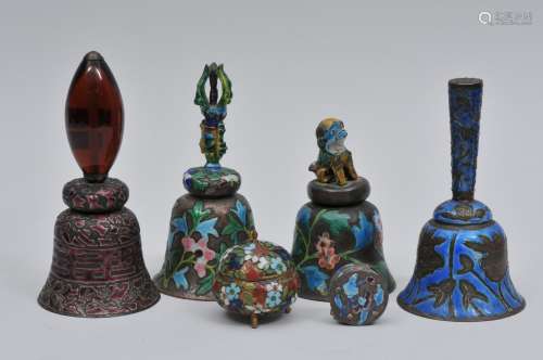Lot of six enameled works. China. Early 20th century. To include: Four bells and two small round boxes. Largest item- 5