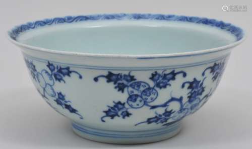 Porcelain bowl. China. 18th century. Underglaze blue decoration of San Duo (Three fruits). Shop mark on the base. 7