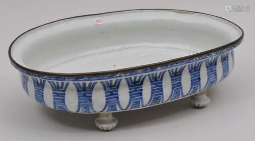 Porcelain planter. Chinese Export ware for the South East Asian market. Oval form with a brass mounted edge. Underglaze blue decoration of Shou (Longlife) characters. Four character honorific mark on the base. Four bun feet added later. 11-1/2