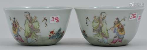 Pair of porcleain cups. China. Early 20th century. Famille Rose decoration of The Immortals. Yung Cheng marks. 3-3/8