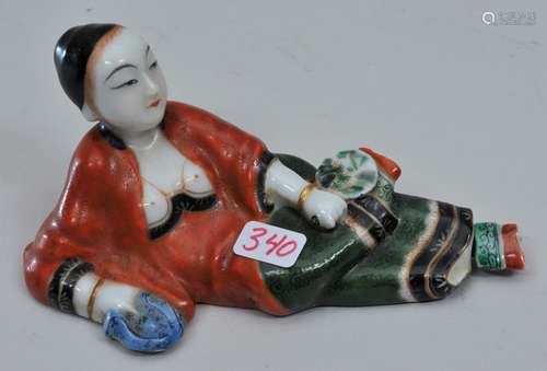 Snuff bottle. China. Early 20th century. Porcelain reclining woman holding a fan. 4