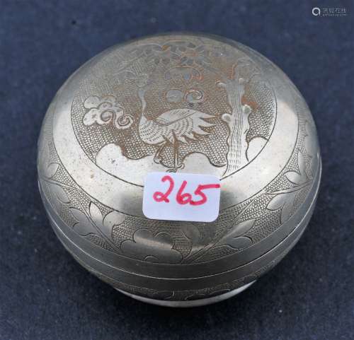 Round Paktong box. China. 19th century Surface engraved with a crane and pine tree on a stippled ground. 2 