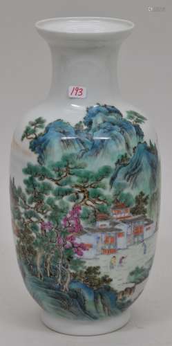 Porcelain vase. China. Early 20th century. Famille Rose decoration of blue and green style landscape. Ch'ien Lung mark on the base. 9