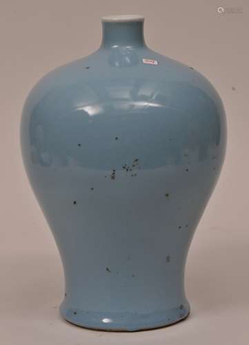 Porcelain vase. China. 19th century. Mei-Ping form. Claire de Lune glaze of pale blue. 12