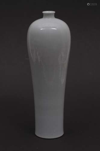 Porcelain vase. China. Early 20th century. Moon white glaze. Ch'ien Lung mark in underglaze blue. 12-3/4