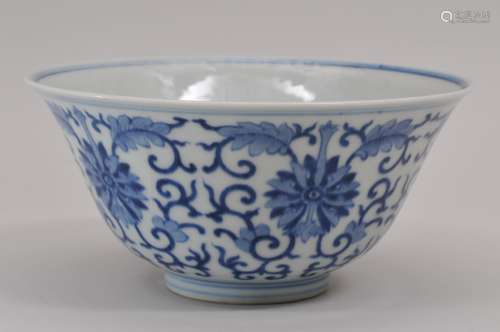Porcelain bowl. China. 20th century. Stylized lotus scrolling in underglaze blue. Kuang Hsu mark. 5-7/8