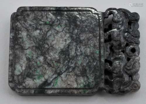Jade pendant. China. 19th century. Rectangular form with a double foo dog finial. Grey stone with areas of apple green. 2-1/2