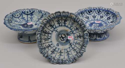 Three porcelain tazzas. Chinese Export ware for the South East Asian market. Underglaze blue stylized floral decoration. Each about 5