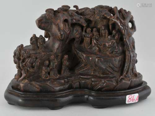 Agarwood carving. China. 19th century landscape with figures in a mountain grotto. 4-1/2