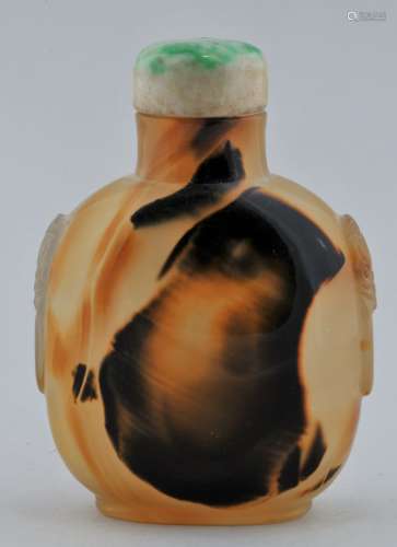 Agate Snuff bottle. China. 19th century. Extremely well hollowed. Lion mask handles. 2-1/2