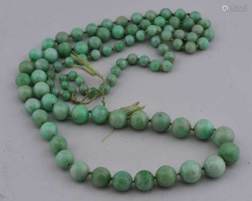 Set of apple green Jadeite beads. Graduated. Largest 1 cm d.