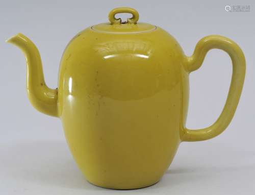 Porcelain tea pot. China. 19th century. Oviform. Mustard yellow monochrome glaze. 5