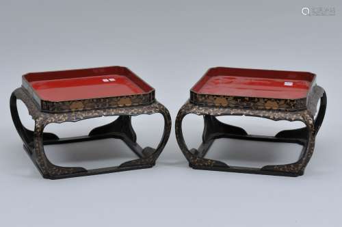 Pair of footed trays. Japan. Early 20th century. Black lacquer with gold floral decoration. 8-1/4