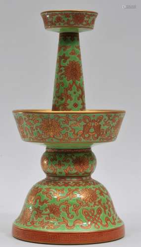 Porcelain candle pricket. China. 20th century. Decoration of eight precious emblems in gold on a chartreuse ground. Chi'Ch'ing mark. 12