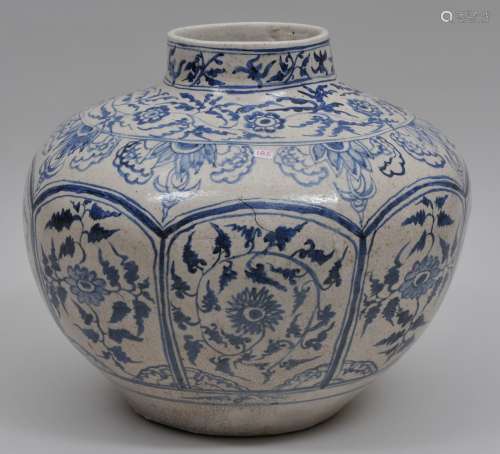 Pottery vase.  Anamese style decoration of floral scrolling in underglaze blue. 12