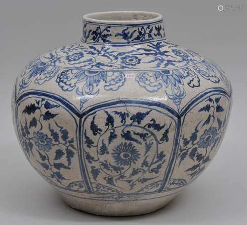 Pottery vase.  Anamese style decoration of floral scrolling in underglaze blue. 12